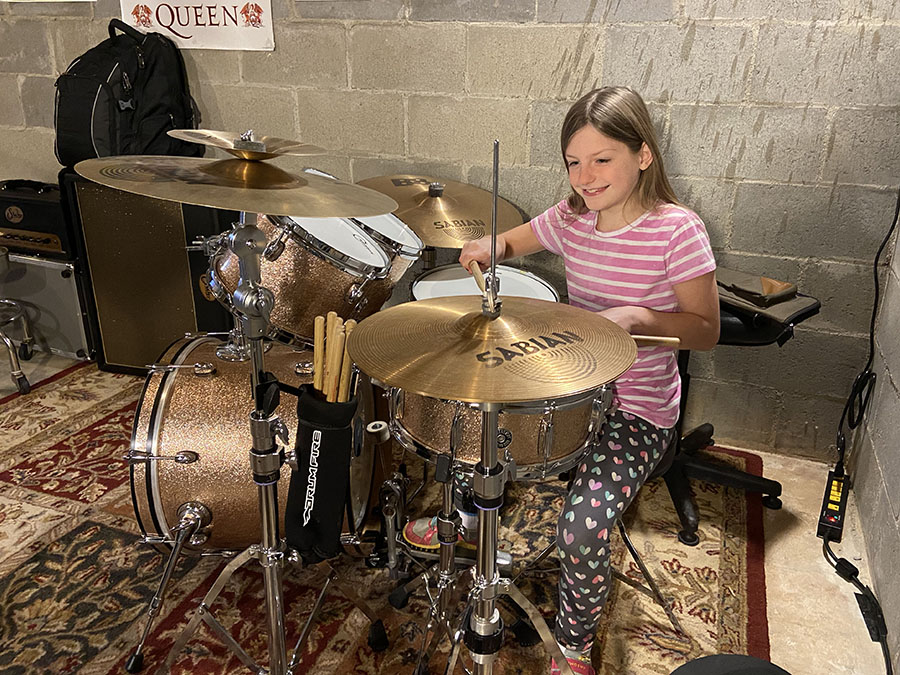 Girl Drum Set Student - The Halls of Music