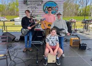 student rock band group on stage