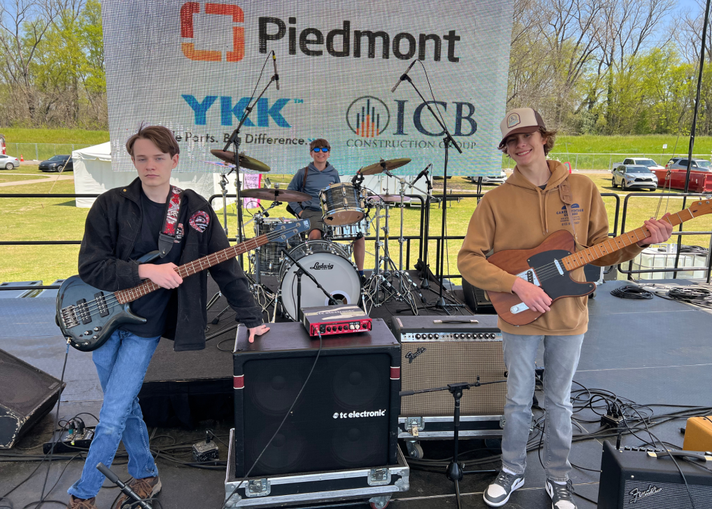 student rock band group on stage